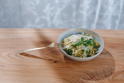 freshly made zucchini noodles with pesto